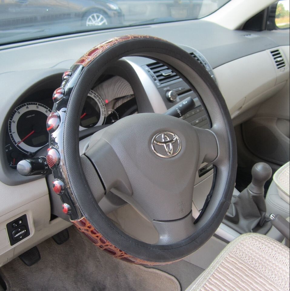 Bt 7159 The Production of Wholesale Imitation Leather Steering Wheel Covers